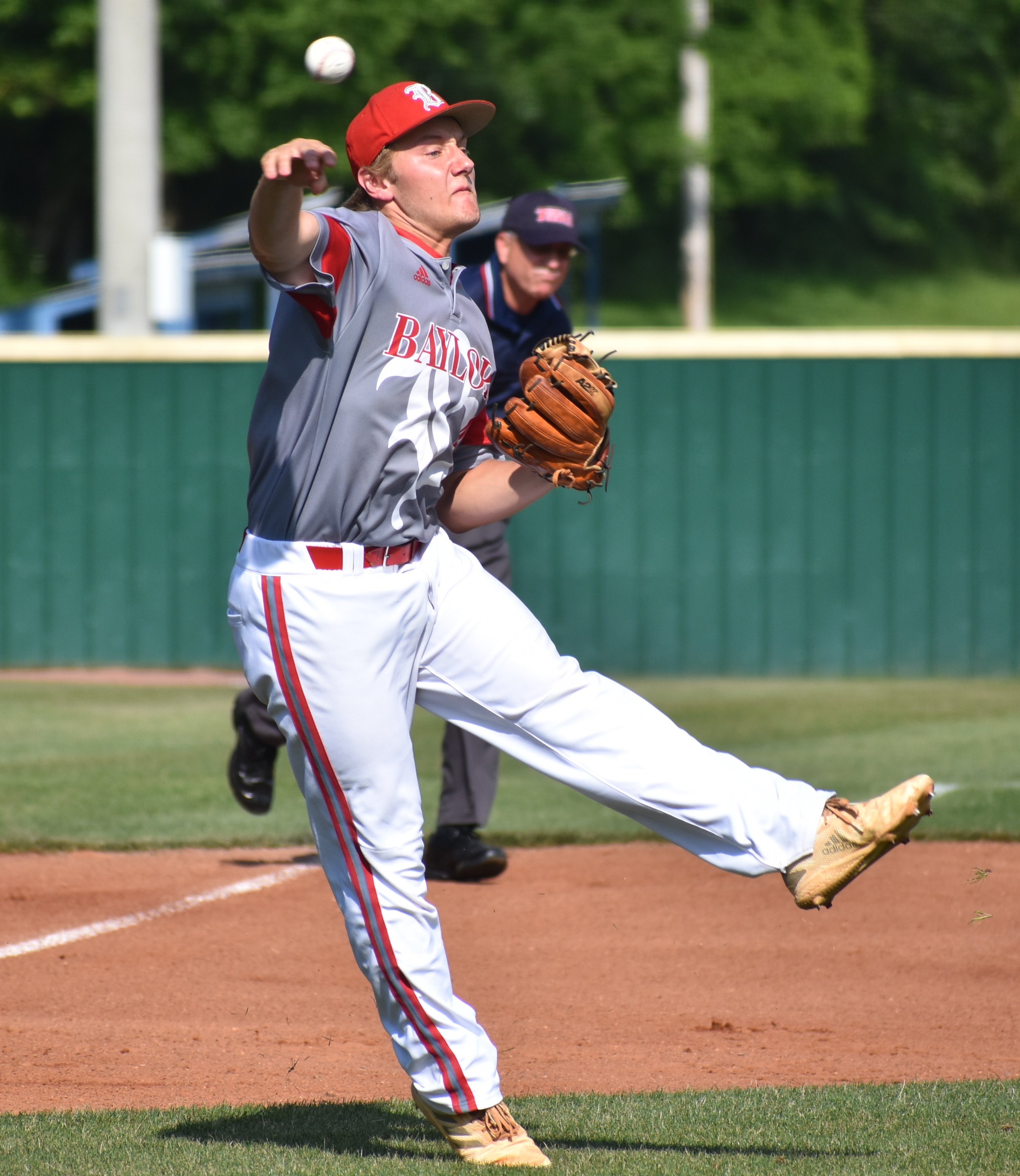 Baylor third baseman Gehrig Ebel records an out in Tuesday's 10-0 victory over Ensworth to begin the Spring Fling. The Red Raiders' last six hits all went for extra bases.