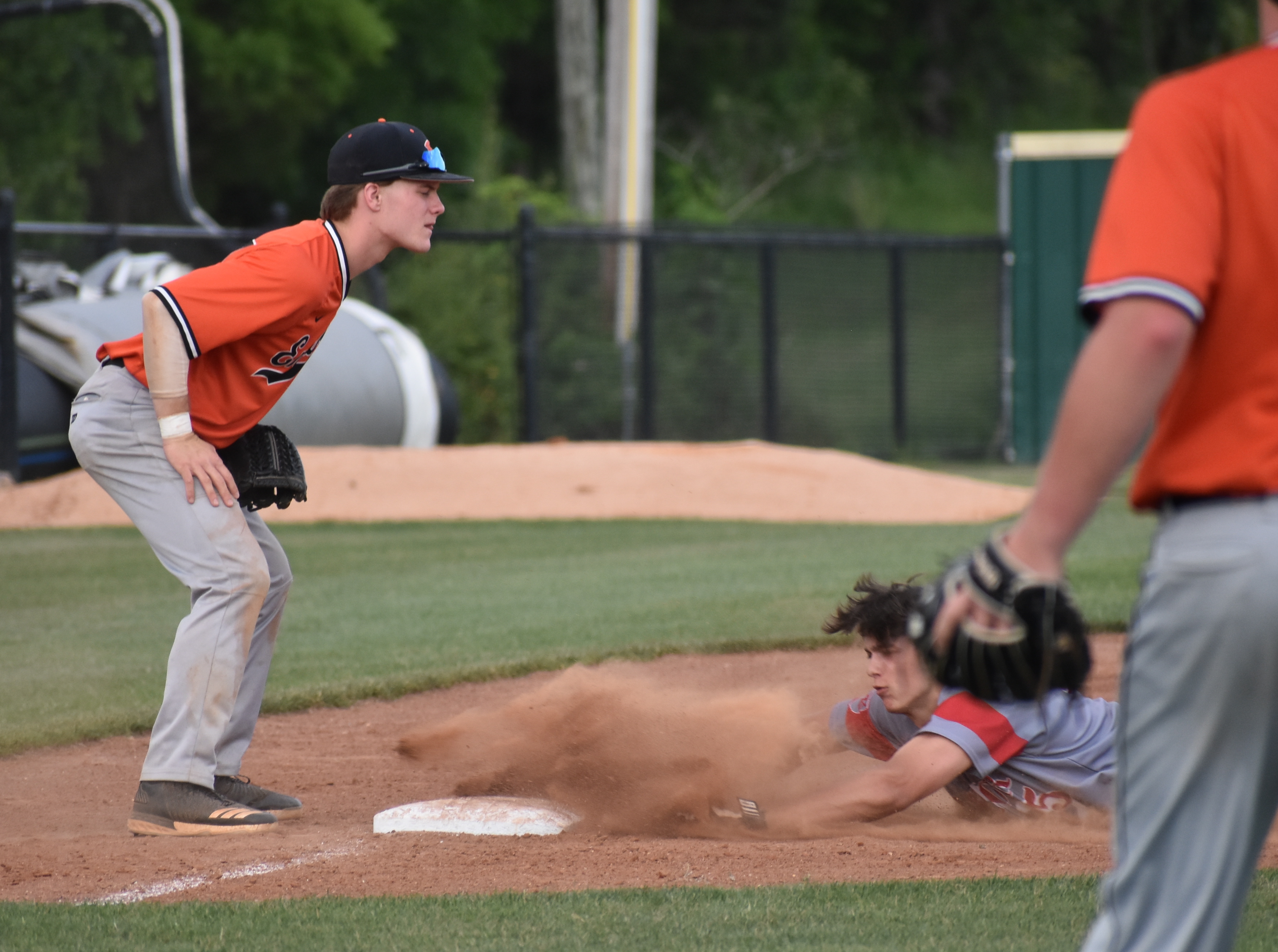 Baylor's Nick Kurtz slides into third base for a three-run triple in Tuesday's 10-0 Division II-AA state tournament win for the Red Raiders.