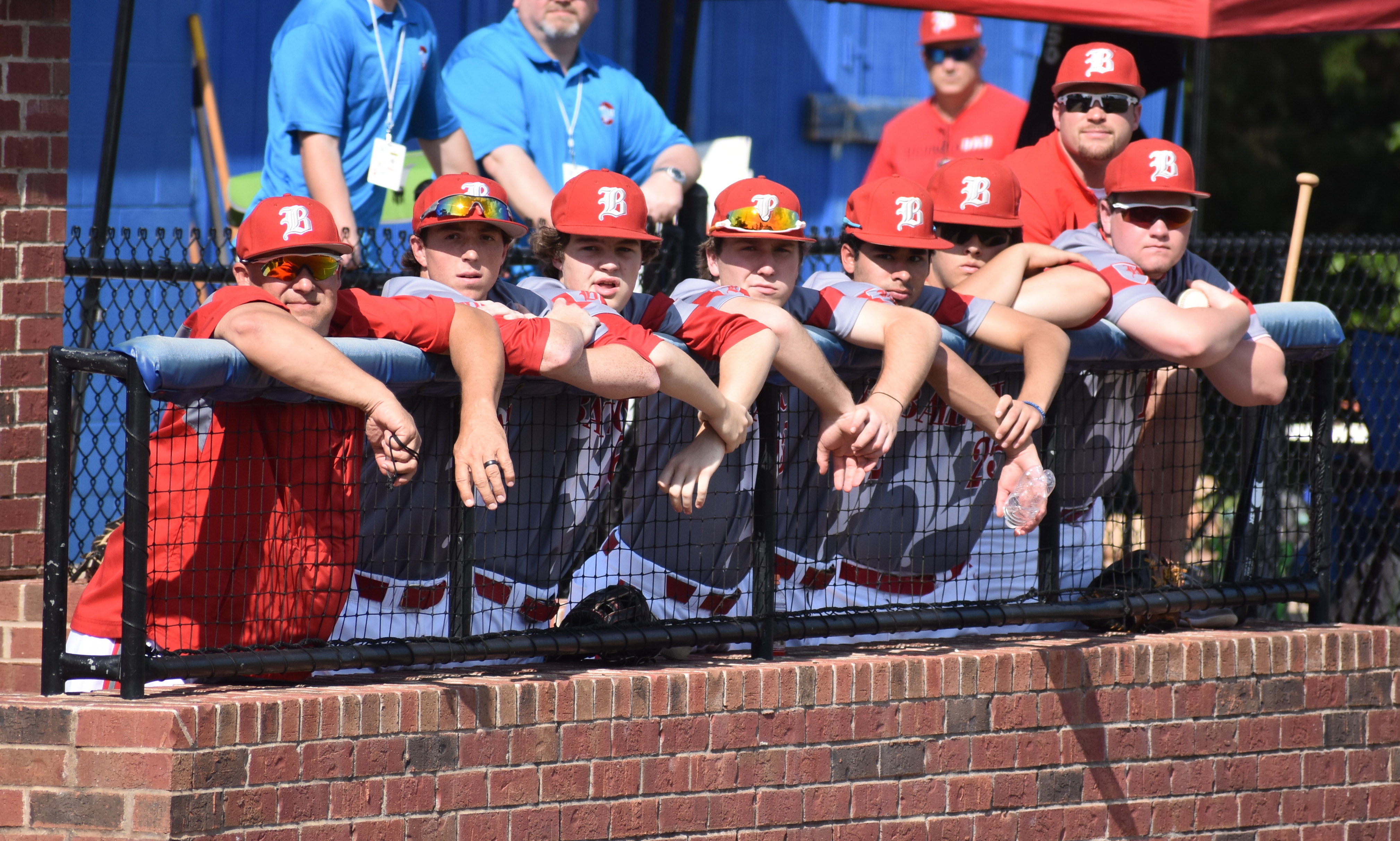 The Baylor School baseball team watches action on the field in its 10-0 win Tuesday against Ensworth at the Division II-AA state tournament. The last six of the Red Raiders' eight hits went for extra bases.
