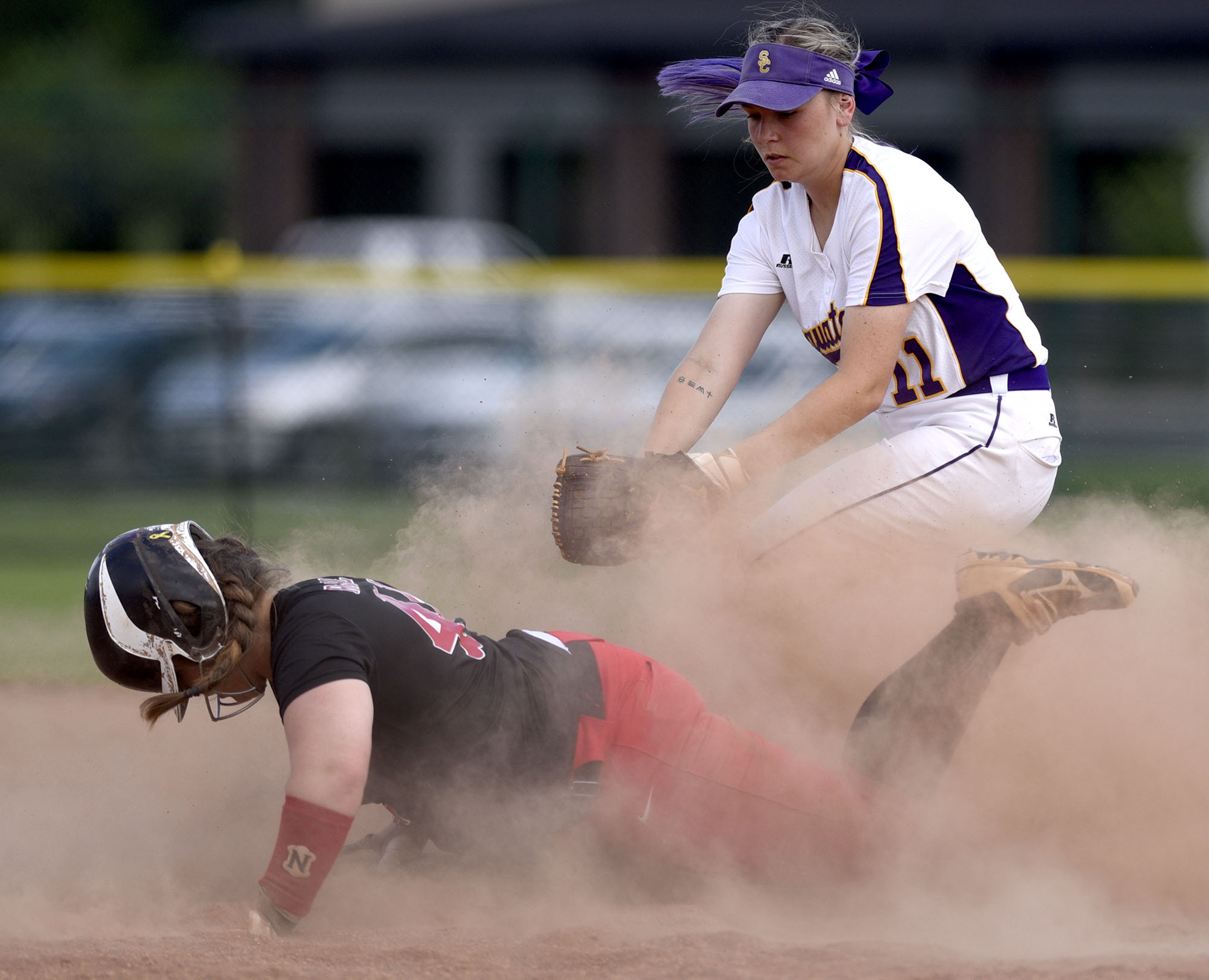 Lexington's Morgan Russell (44) is safe at second as Sequatchie's Peyton Longson (11) is late with the tag. The TSSAA Softball Tournament was held at the Starplex in Murfreesboro on May 21, 2019.