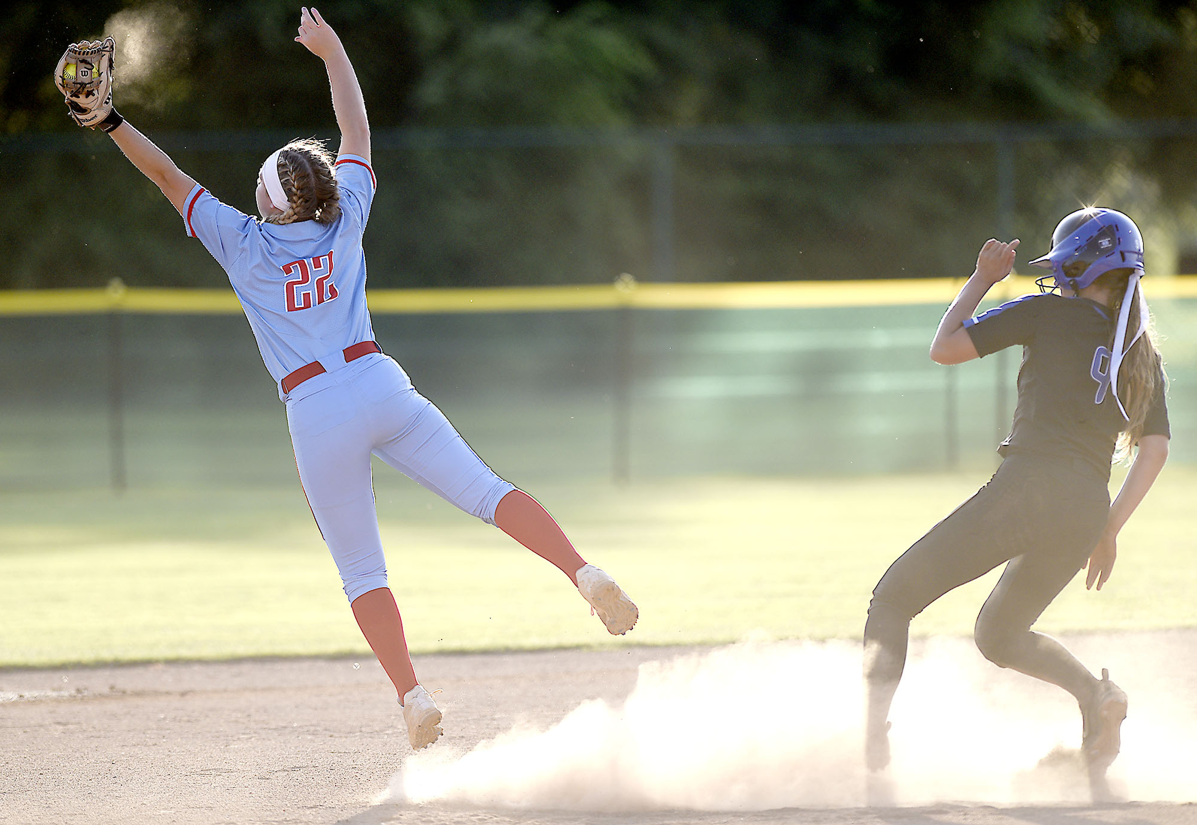 GPS's Chapel Cunningham (9) is safe at second while St. Benedict's Gabriella Ray (22) takes the throw. GPS faced St. Benedict in Class AA bracket. The TSSAA Softball Tournament was held at the Starplex in Murfreesboro on May 21, 2019.