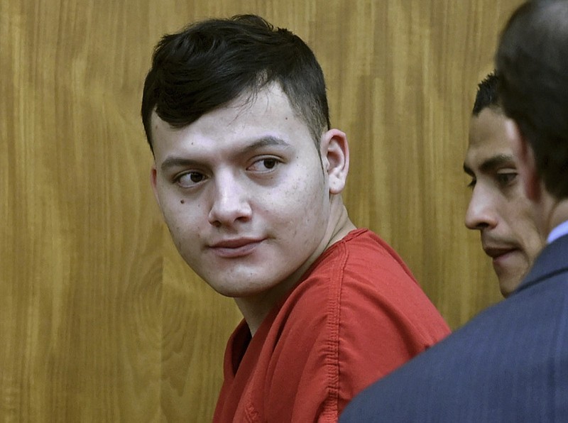 Wilber Martinez-Guzman, from El Salvador, appears in Washoe District Court room in Reno, Nev., on Monday, May 20, 2019. Martinez-Guzman faces murder, burglary and weapons charges in the deaths of four people in northern Nevada in January. (Andy Barron/Reno Gazette-Journal via AP, Pool)

