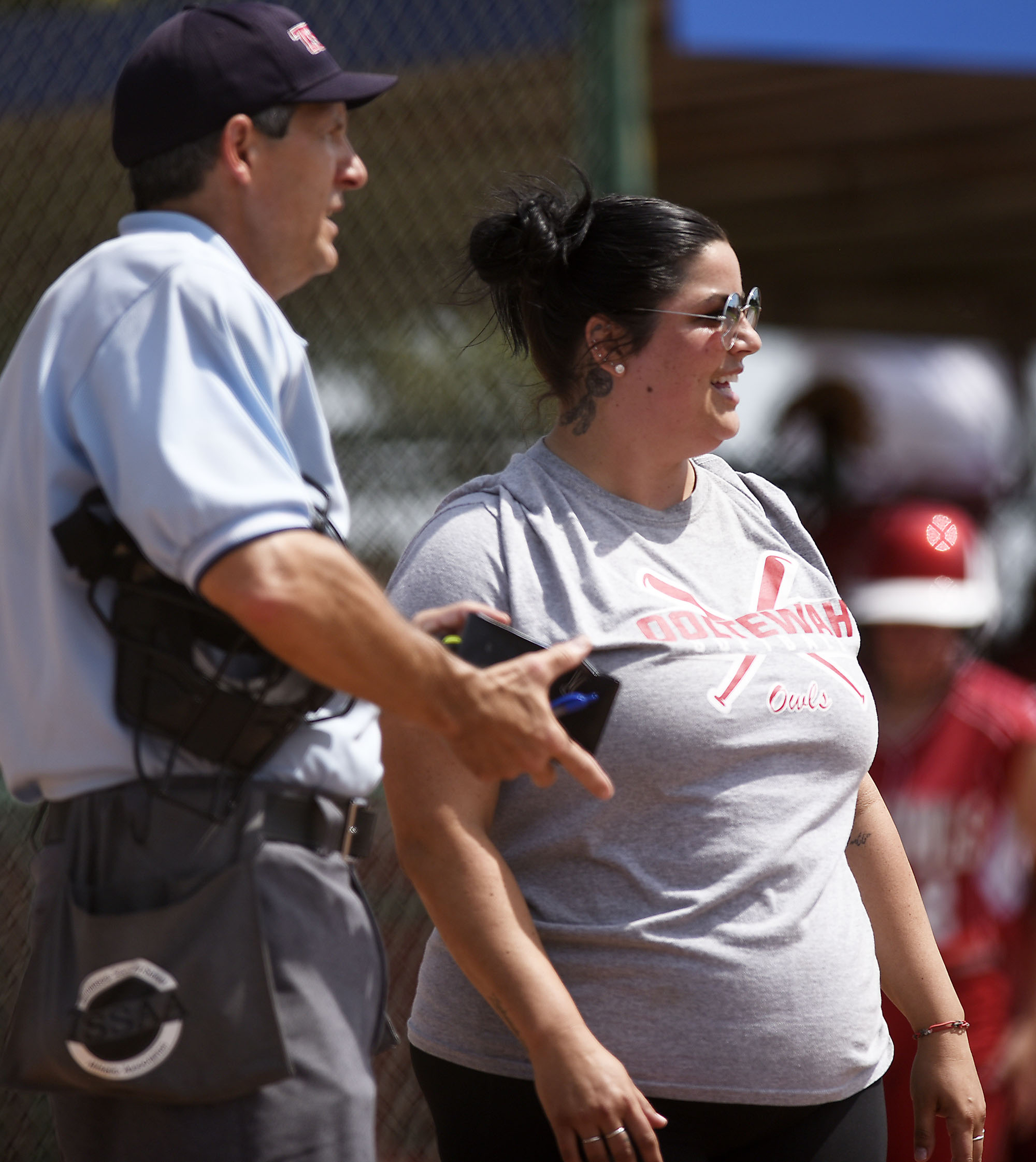 Ooltewah's head coach Kerilyn Mongar talks with the umpire as she makes a subsutution. Ooltewah faced Dyer County in quarterfinals of the TSSAA Class AAA state girls's softball tournament at the Starplex in Murfreesboro on May 22, 2019.