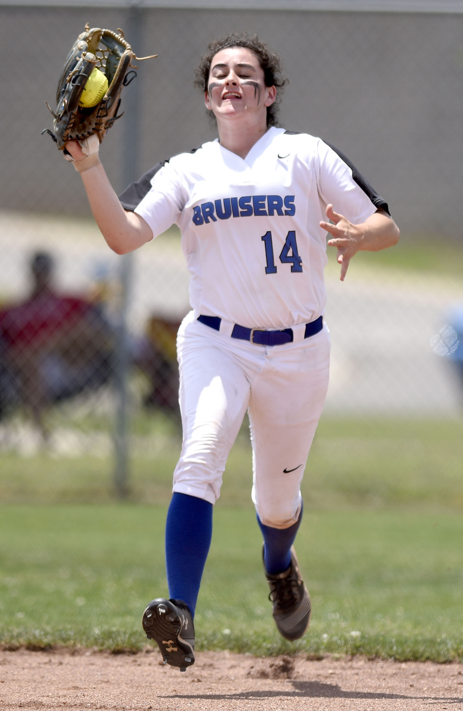 GPS's Elizabeth Warwick (14) charges into to catch a short fly ball. GPS face Baylor in the semifinals of the TSSAA Division II Class AA State Girls's softball tournament at McKnight Fields on May 22, 2019.