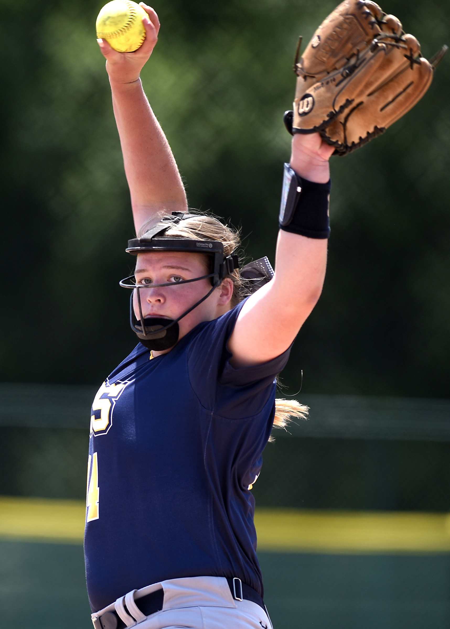 Madison Hollis (14) pitches for CCS. Chattanooga Christian faced Davidson Academy in the quarterfinals of the TSSAA Division II Class A state girls's softball tournament held at the Starplex in Murfreesboro on May 22, 2019.