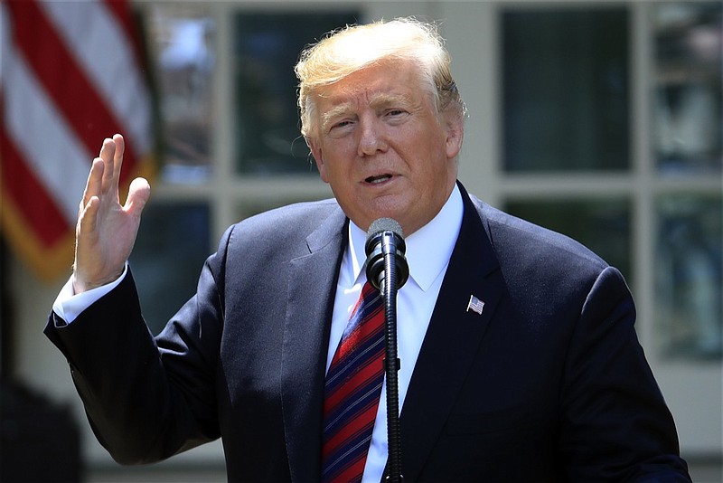 In this May 16, 2019, file photo, President Donald Trump speaks in the Rose Garden of the White House in Washington. A judge is poised to hear oral arguments Wednesday, May 22, 2019, over Trump's effort to block congressional subpoenas seeking financial records from two banks. The hearing occurs after congressional Democrats sought the information from Deutsche Bank and Capital One. (AP Photo/Manuel Balce Ceneta, File)