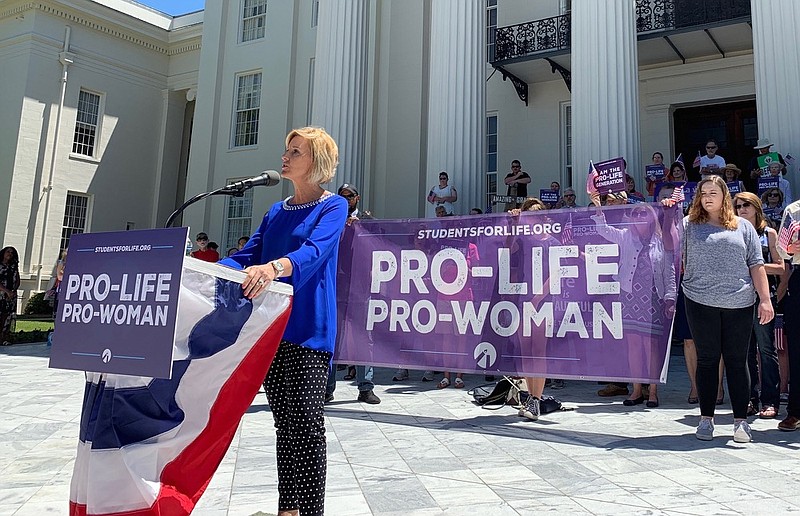 Beck Gerritson, president of Eagle Forum of Alabama, speaks at an anti-abortion rally outside the Capitol in Montgomery, Ala., on Wednesday, May 22, 2019. Groups that oppose abortion held the event to thank lawmakers who supported passage of a law that would virtually outlaw abortion in the state. (AP Photo/Kim Chandler)

