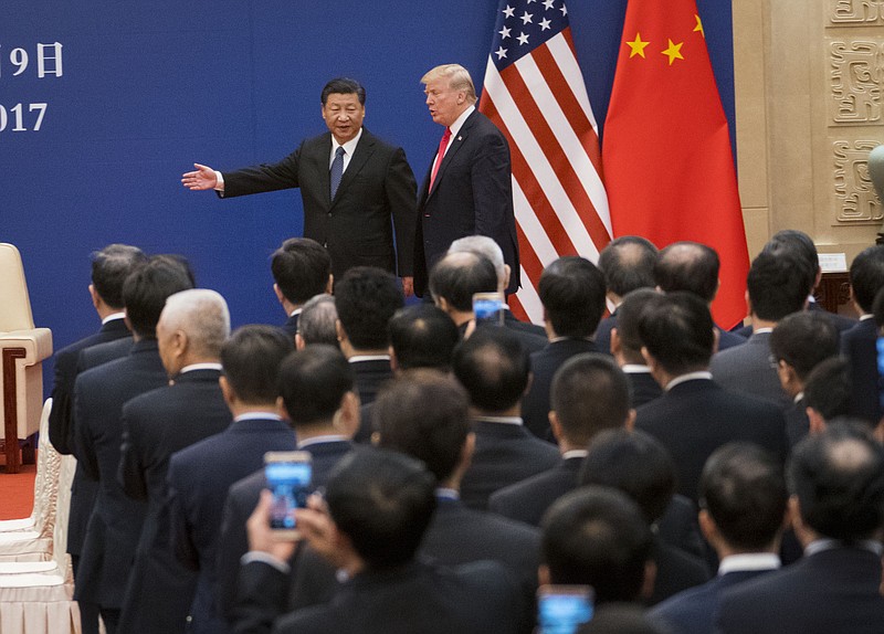 President Donald Trump and President Xi Jinping of China in Beijing on Nov. 9, 2017. Trump upended what appeared to be steady progress toward reaching a trade pact after he threatened on May 5, 2019, to impose still more tariffs on Chinese-made goods unless Beijing moves closer to a deal. Amid uncertainly over trade talks set to take place in the coming week, economists and investors worry that new tariffs would stop China's economic recovery. (Doug Mills/The New York Times)