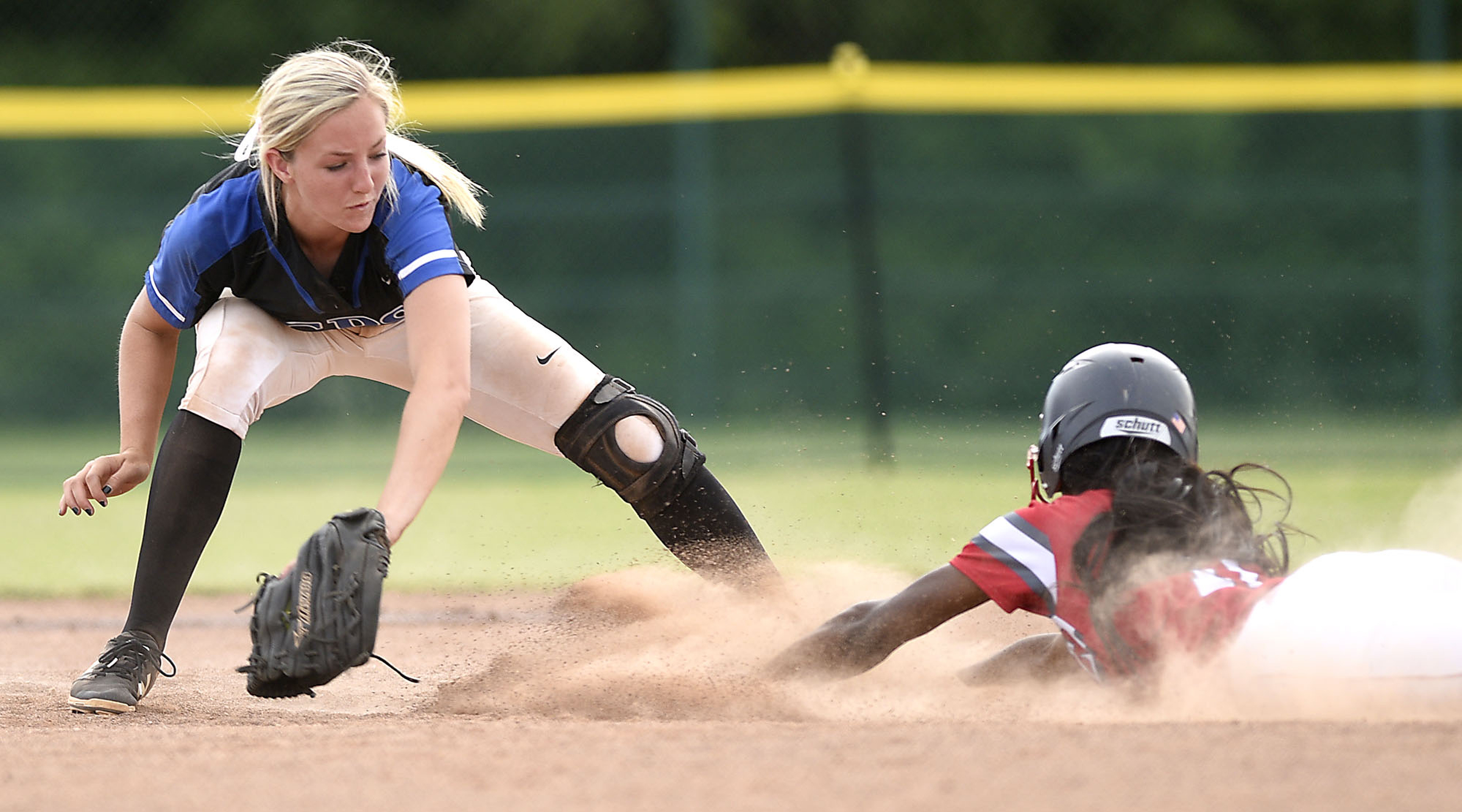 Baylor's Makayla Packer (11) is safe at second with the steal as GPS's Kaitlyn Songer (11) is late with the tag. Baylor defeated GPS 2-1 for the TSSAA Division II Class AA softball championship at the Starplex in Murfreesboro on May 23, 2019.