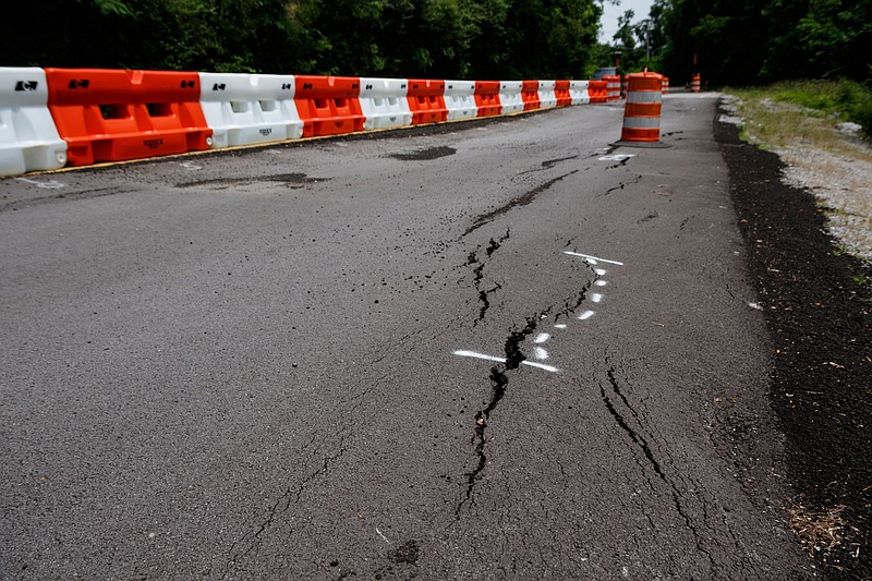 A portion of Lake Resort Drive is reduced to a single lane following damage to the roadway, seen here on Thursday, May 23, 2019, in Chattanooga, Tenn. 