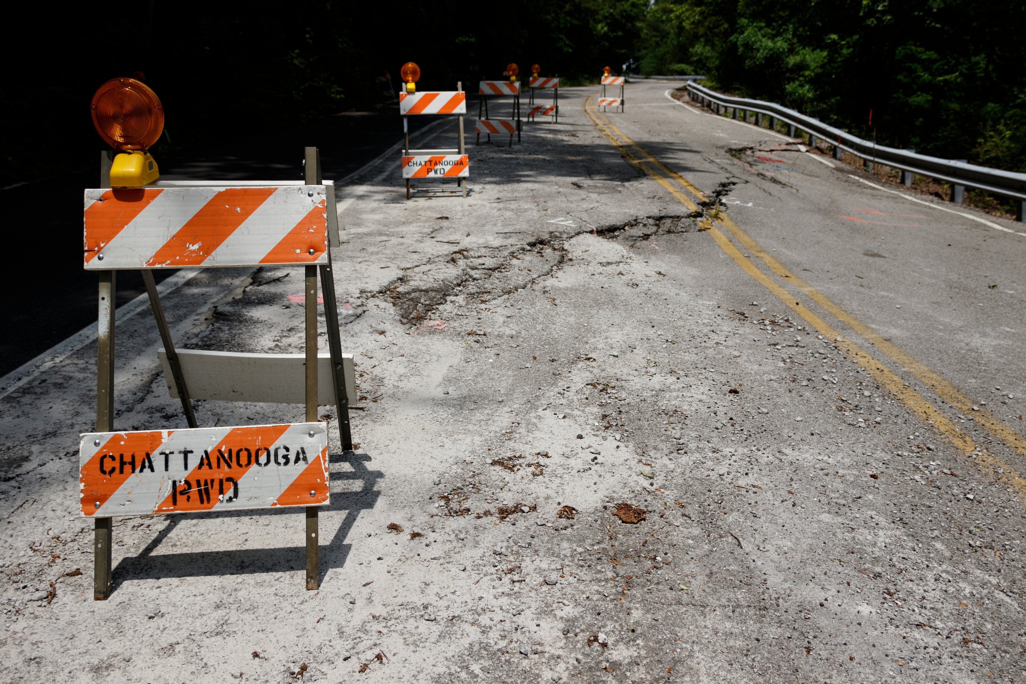 A portion of Elder Mountain Road is reduced to one land following damage to the roadway, seen here on Thursday, May 23, 2019, in Chattanooga, Tenn.