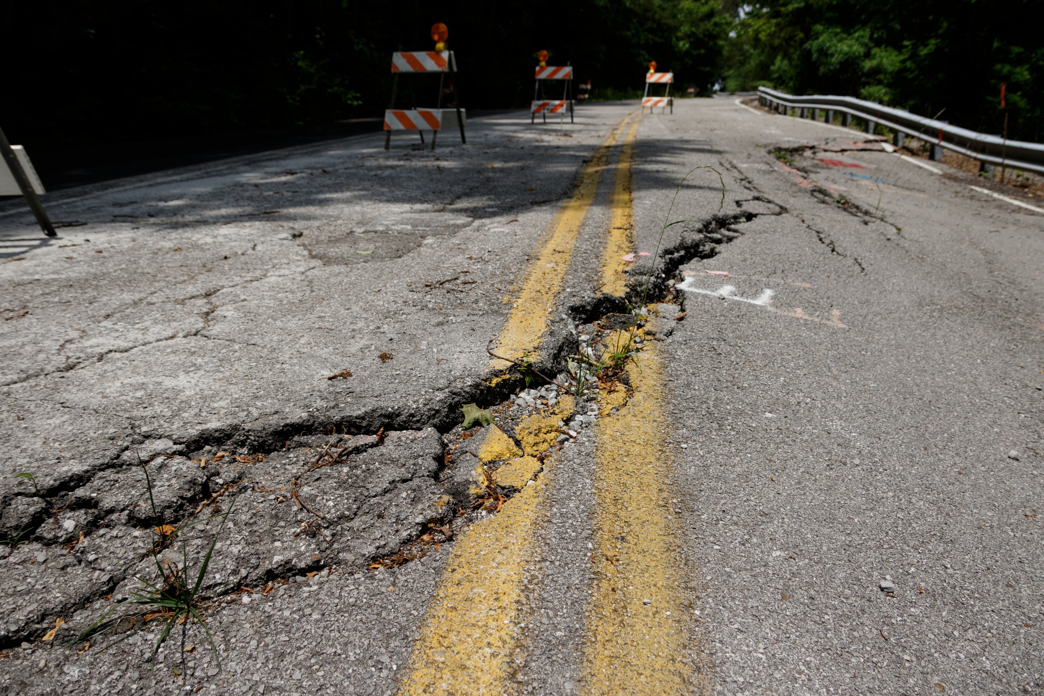 A portion of Elder Mountain Road is reduced to one land following damage to the roadway, seen here on Thursday, May 23, 2019, in Chattanooga, Tenn.