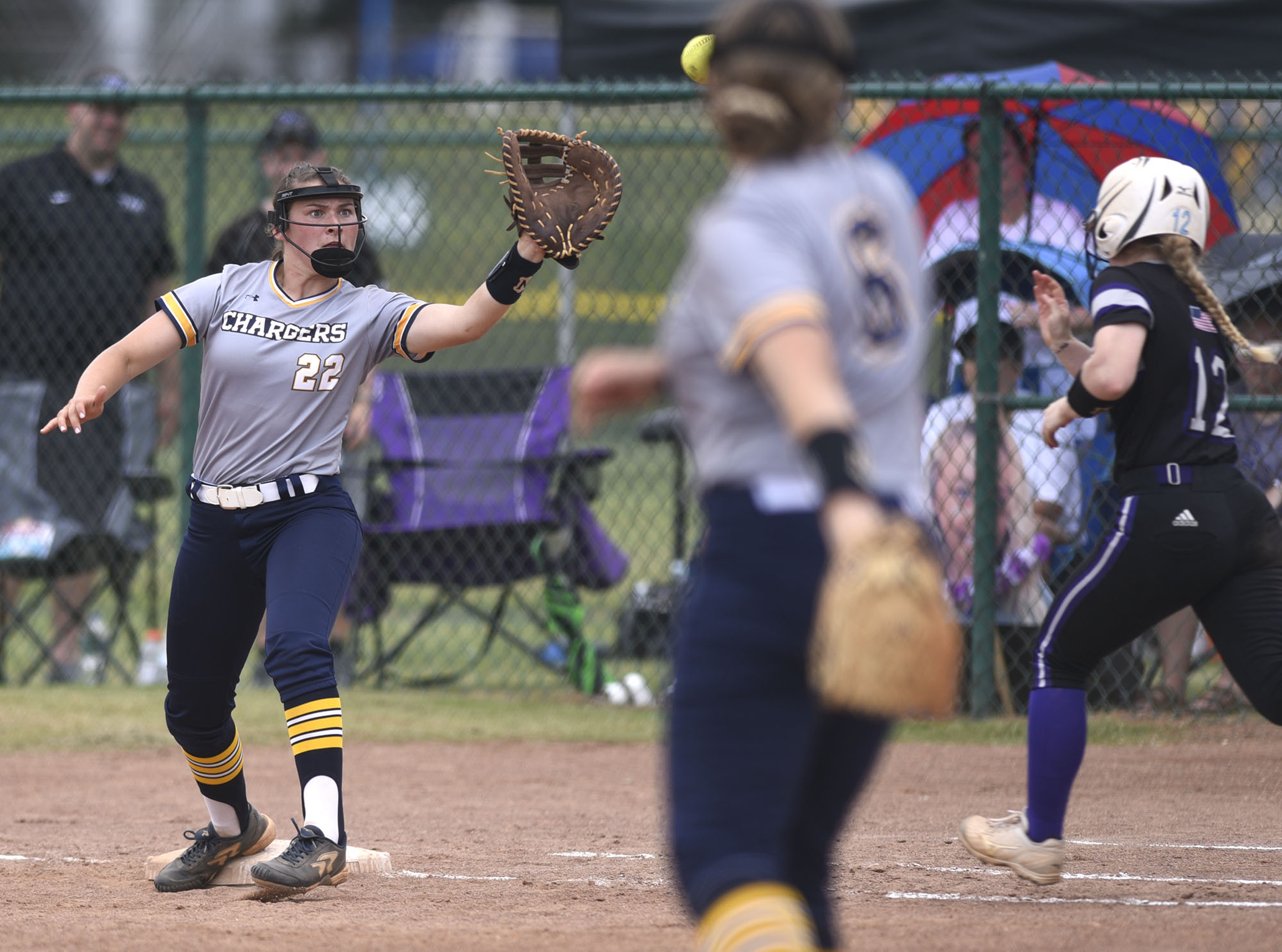 CCS third baseman Lauren Kay (6) throws to first baseman Rachel Kay (22) to get Katelyn Norris (12) out. Chattanooga Christian School lost to King's Academy 3-1 in the finals of the TSSAA Division II Class A softball championship held at the Starplex in Murfreesboro on May 24, 2019.