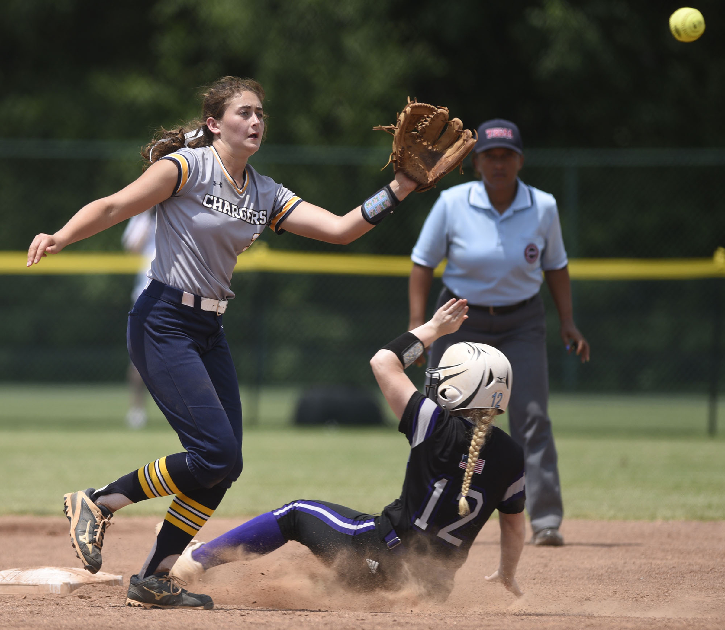 CCS shortstop Mary Vandergriff (3) takes the throw while King's Academy's Katelyn Norris (12) is safe at second. Chattanooga Christian School lost to King's Academy 3-1 in the finals of the TSSAA Division II Class A softball championship held at the Starplex in Murfreesboro on May 24, 2019.