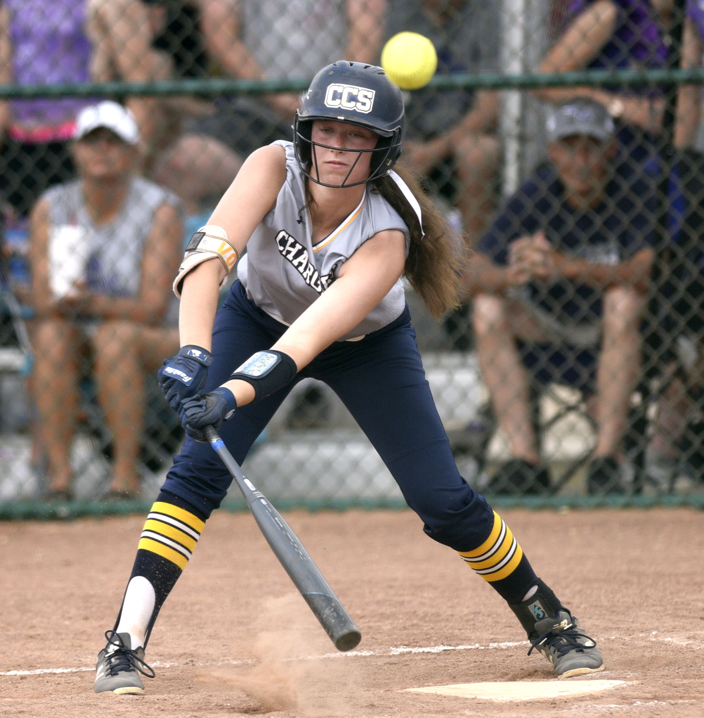 CCS's Savannah Ricketts (25) reaches to foul a ball off to stay alive in her at bat. Ricketts would get a single a few pitches later. Chattanooga Christian School lost to King's Academy 3-1 in the finals of the TSSAA Division II Class A softball championship held at the Starplex in Murfreesboro on May 24, 2019.