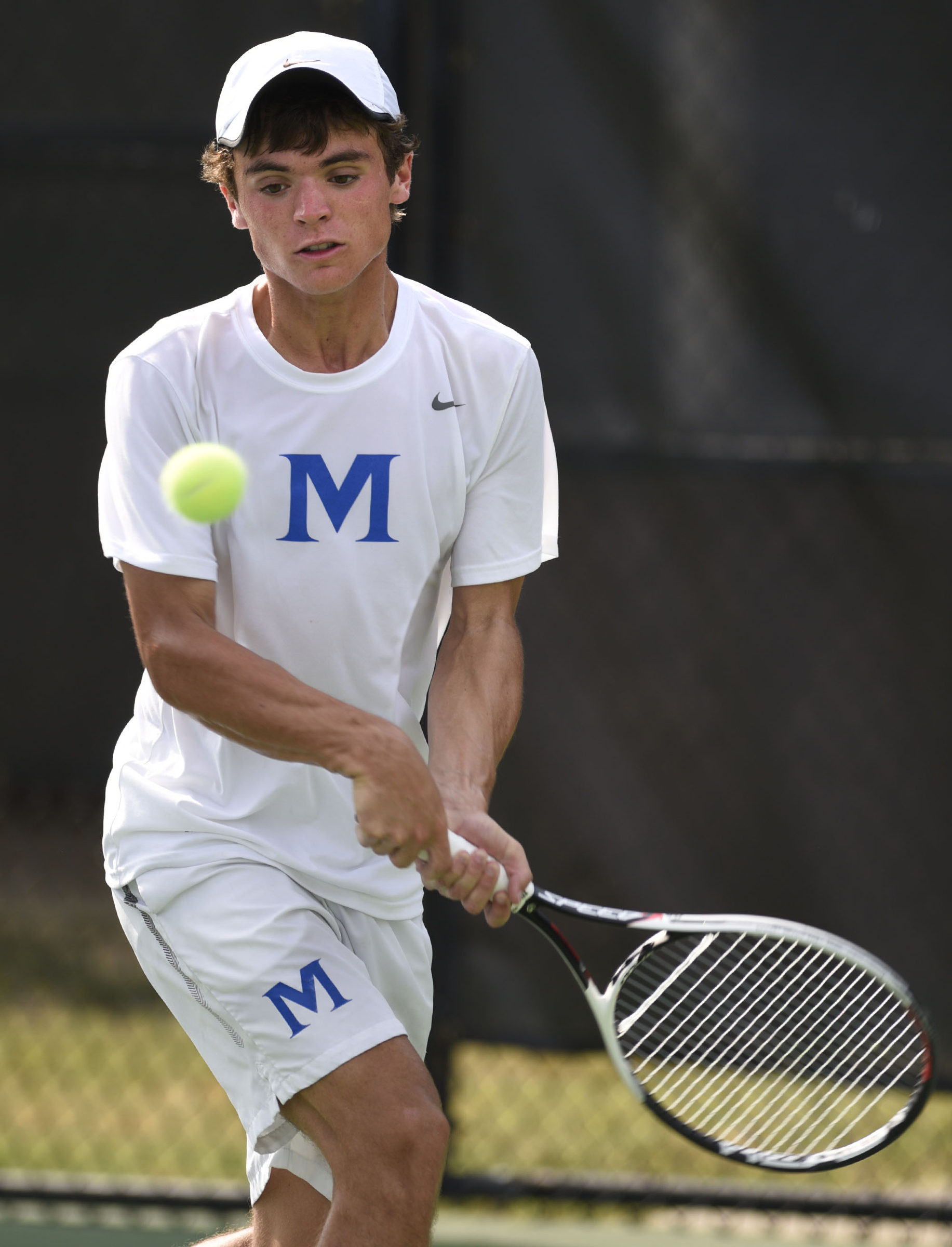 McCallie's Will Leathers hits a backhand during his watch with Baylor Sai of MBA. The finals of the TSSAA Tennis Tournament were held at the Adams Tennis Complex in Murfreesboro on May 24, 2019.