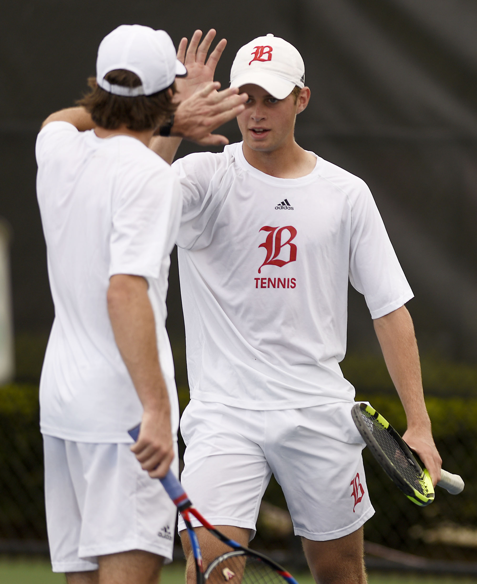 Baylor's Benji Taverene, left, and Hunter Smith celebrate a point in their match with McCallie's John Knight and Charlie Park. The finals of the TSSAA Tennis Tournament were held at the Adams Tennis Complex in Murfreesboro on May 24, 2019.