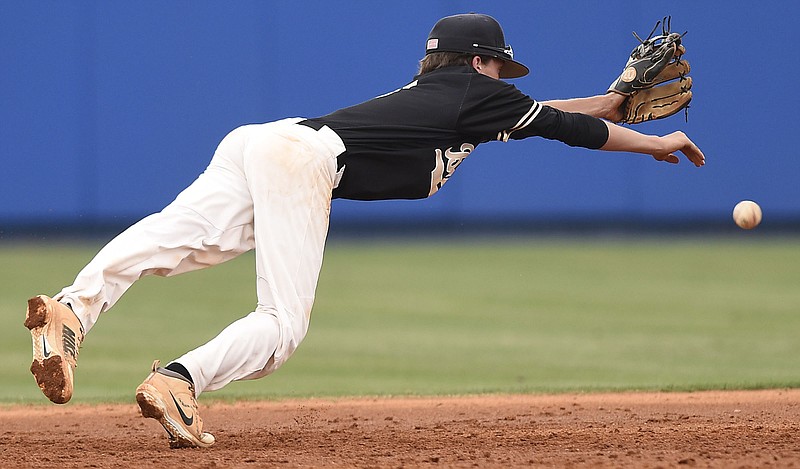 Bradley shortstop Ashton Simmons dives in attempt to stop a Farabut basehit.  The ball got through.  The Bradley Central Bears lost to the Farragut Admirals in the championship game of the TSSAA Class AAA baseball tournament at Reese Smith Jr. Field on the campus of Middle Tennessee University in Murfreesboro on May 24, 2019.