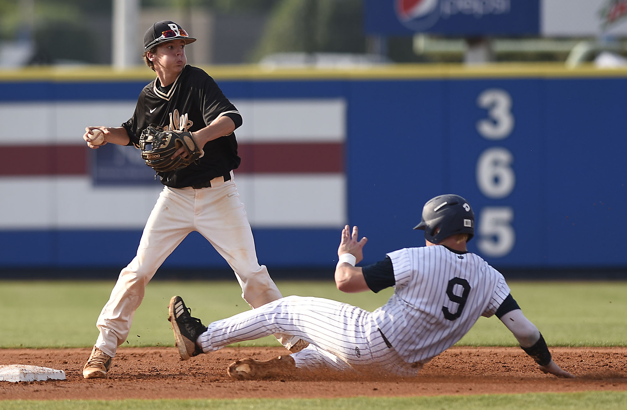 Bradley shortstop Ashton Simmons (9) forces the Farragut runner, but can't make the runner at first. The Bradley Central Bears lost to the Farragut Admirals in the championship game of the TSSAA Class AAA baseball tournament at Reese Smith Jr. Field on the campus of Middle Tennessee University in Murfreesboro on May 24, 2019.