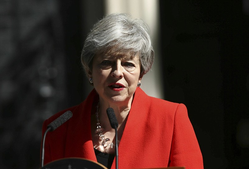 Britain's Prime Minister Theresa May makes a statement outside at 10 Downing Street in London, Friday May 24, 2019. Theresa May says she'll quit as UK Conservative leader on June 7, sparking contest for Britain's next prime minister. (Yui Mok/PA via AP)