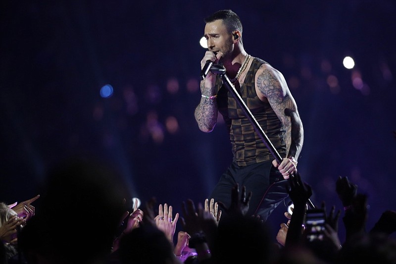 In this Feb. 3, 2019, file photo, Adam Levine, of Maroon 5, performs during halftime of the NFL Super Bowl 53 football game between the Los Angeles Rams and the New England Patriots in Atlanta. Levine is leaving NBC s The Voice after 16 seasons. Carson Daly made the announcement Friday morning, May 24 on the Today show. Daly said Gwen Stefani will return for season 17 in Levine s chair. (AP Photo/Mark Humphrey, File)