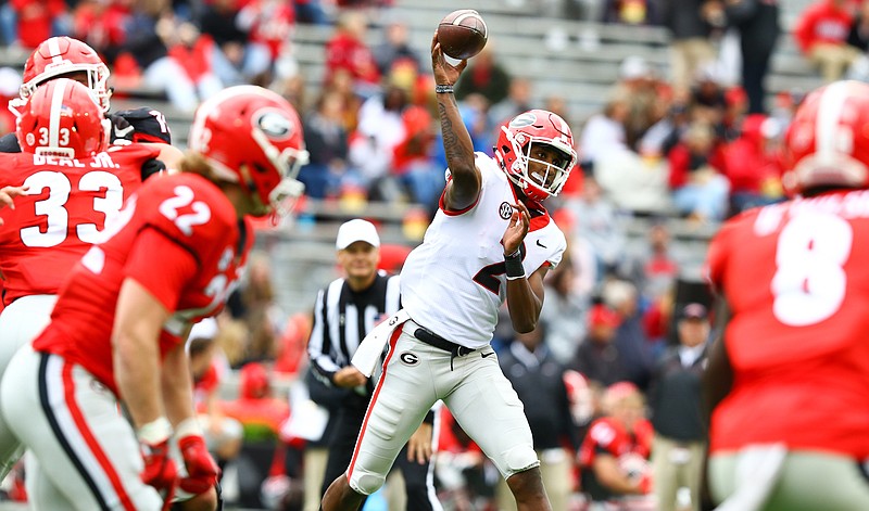 Georgia freshman quarterback D'Wan Mathis throws one of his 28 passes during last month's G-Day game inside Sanford Stadium.