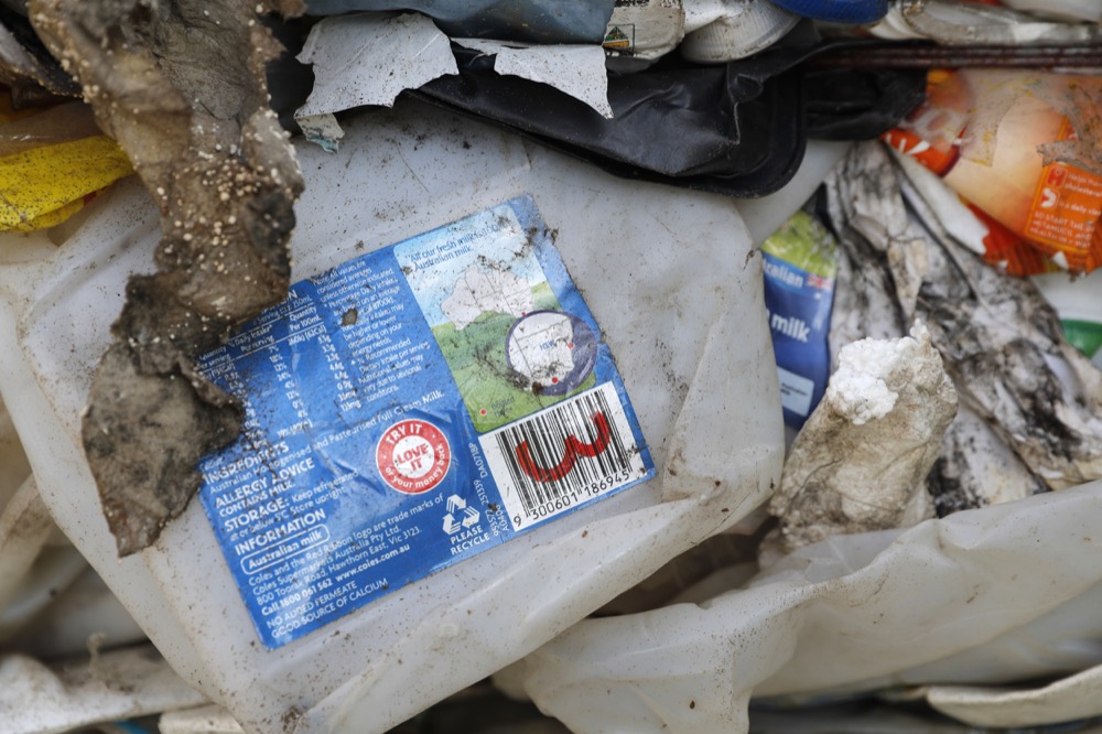 Non-recyclable plastic scraps inside a container from Australia detained by authority's are seen at westport in Klang, Malaysia, Tuesday, May 28, 2019. Malaysia environment minister Yeo Bee Yin says Malaysia has become a dumping ground for the world's plastic waste, and Malaysia has begun sending non-recyclable plastic scrap to the developed countries of origin.(AP Photo/Vincent Thian)