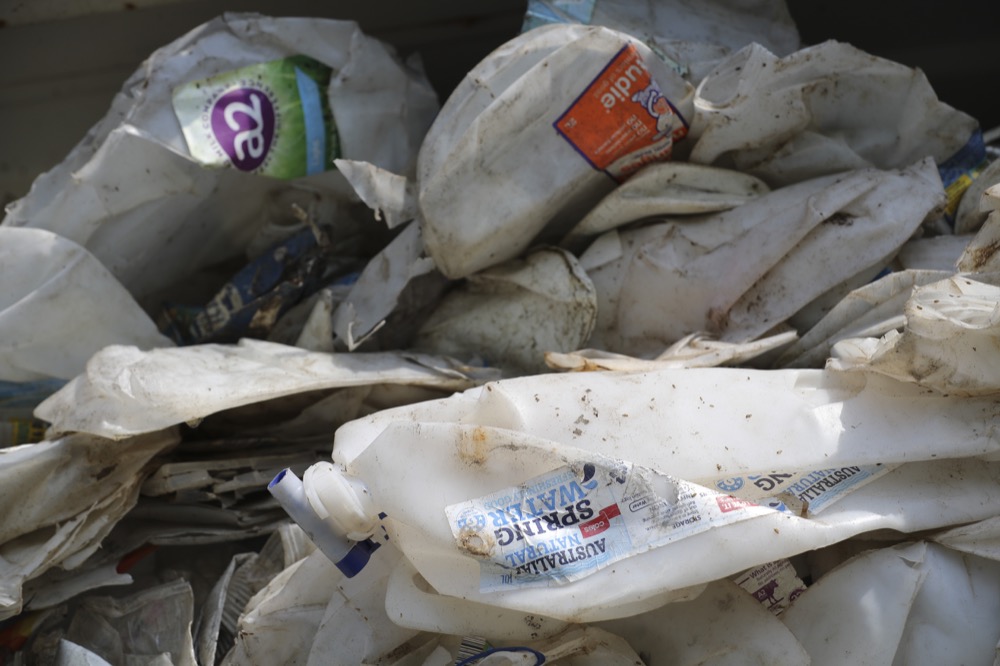 A container filled with plastic waste from Australia in Port Klang, Malaysia, Tuesday, May 28, 2019. Malaysia says it will send back some 3,000 metric tonnes (330 tons) of non-recyclable plastic waste to countries including the U.S., U.K., Canada and Australia in a move to avoid becoming a dumping ground for rich nations. (AP Photo/Vincent Thian)