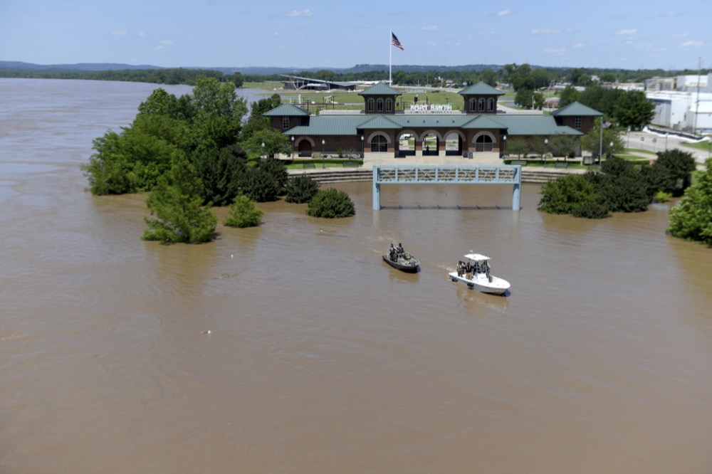 The Arkansas River floods Harry E. Kelley River Park in Fort Smith Thursday, May 30, 2019, in Fort Smith, Ark. (AP Photo/Michael Woods)