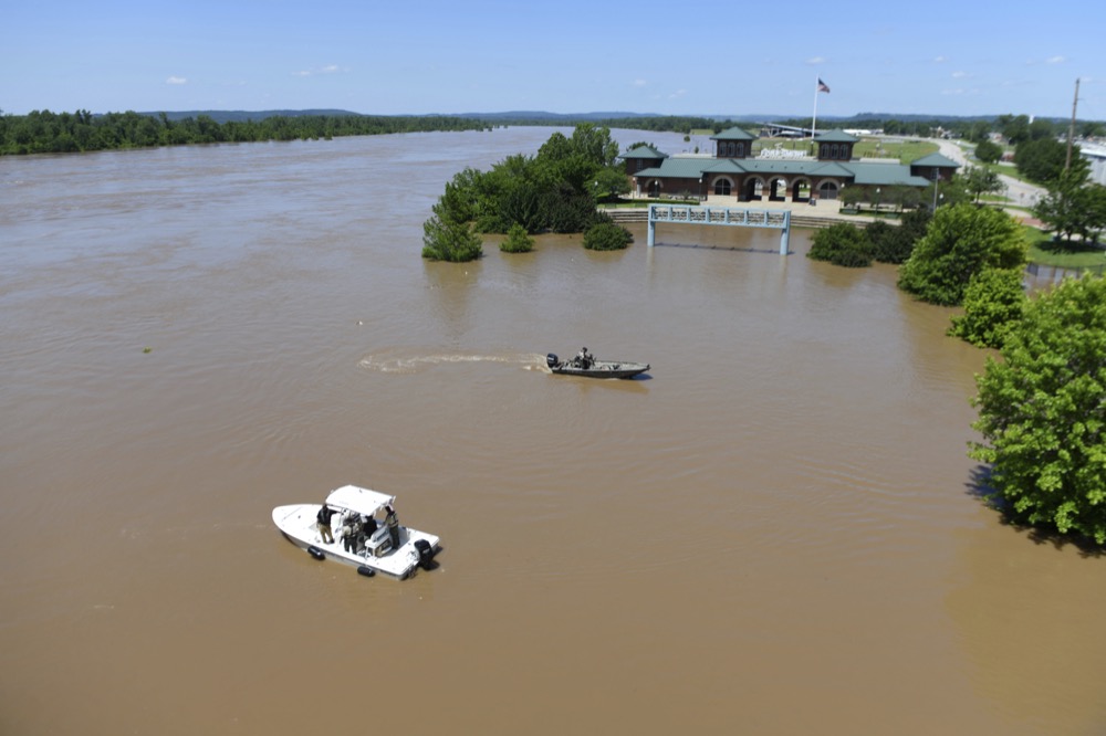 The Arkansas River floods Harry E. Kelley River Park Thursday, May 30, 2019, in Fort Smith, Ark. (AP Photo/Michael Woods)