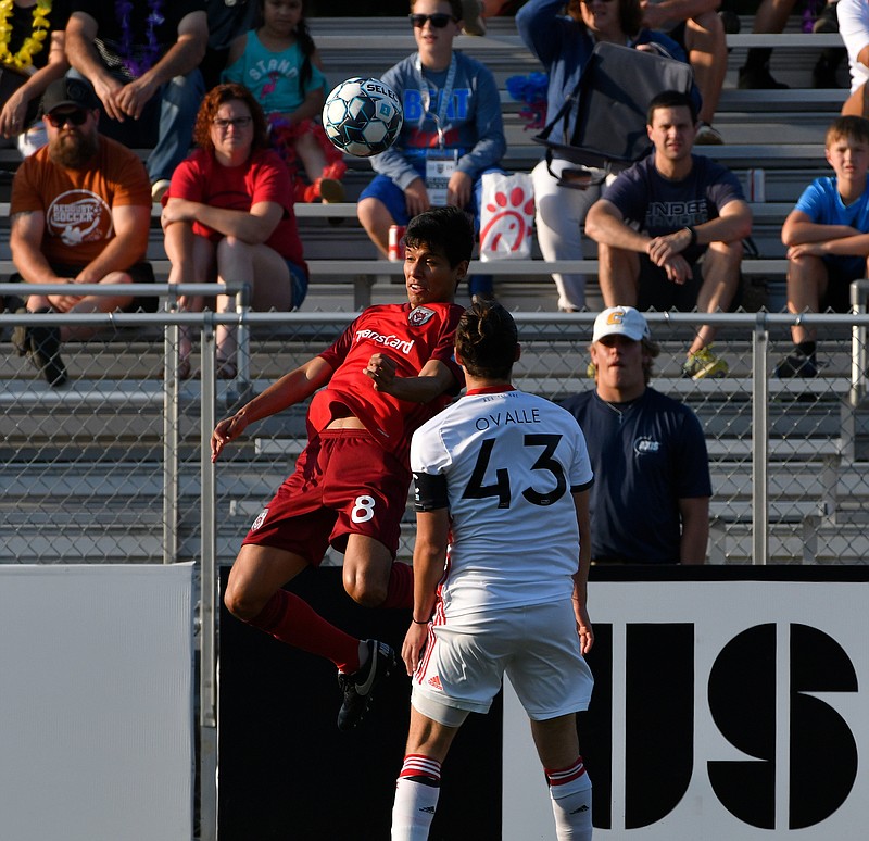 Chattanooga Red Wolves SC midfielder Josue Soto leaps for the ball over a Toronto FC II defender in a USL League One match Saturday at Chattanooga Christian School's David Stanton Field. The teams tied 2-2.