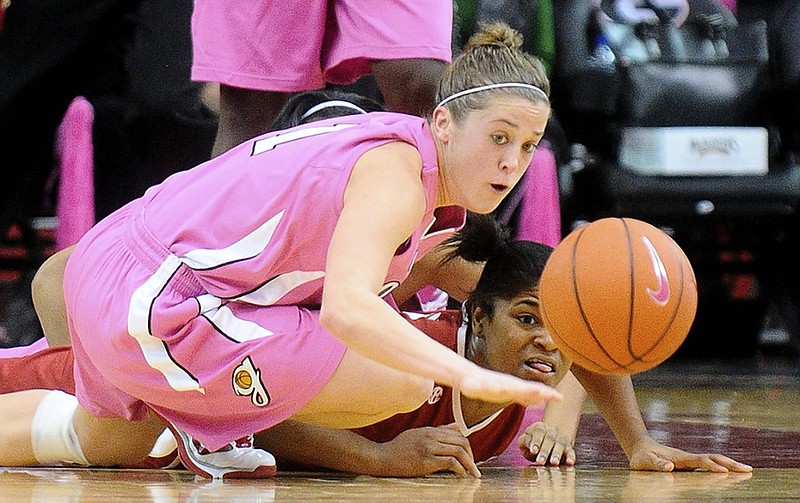 Georgia's Ashley Houts, left, and Alabama's Tierney Jenkins scramble for a loose ball during an SEC women's basketball matchup in February 2010 in Athens, Ga. Houts, who played at Dade County High School in Trenton before going on to join the Lady Bulldogs and followed that by playing professionally, has been hired as an assistant at East Tennessee State.