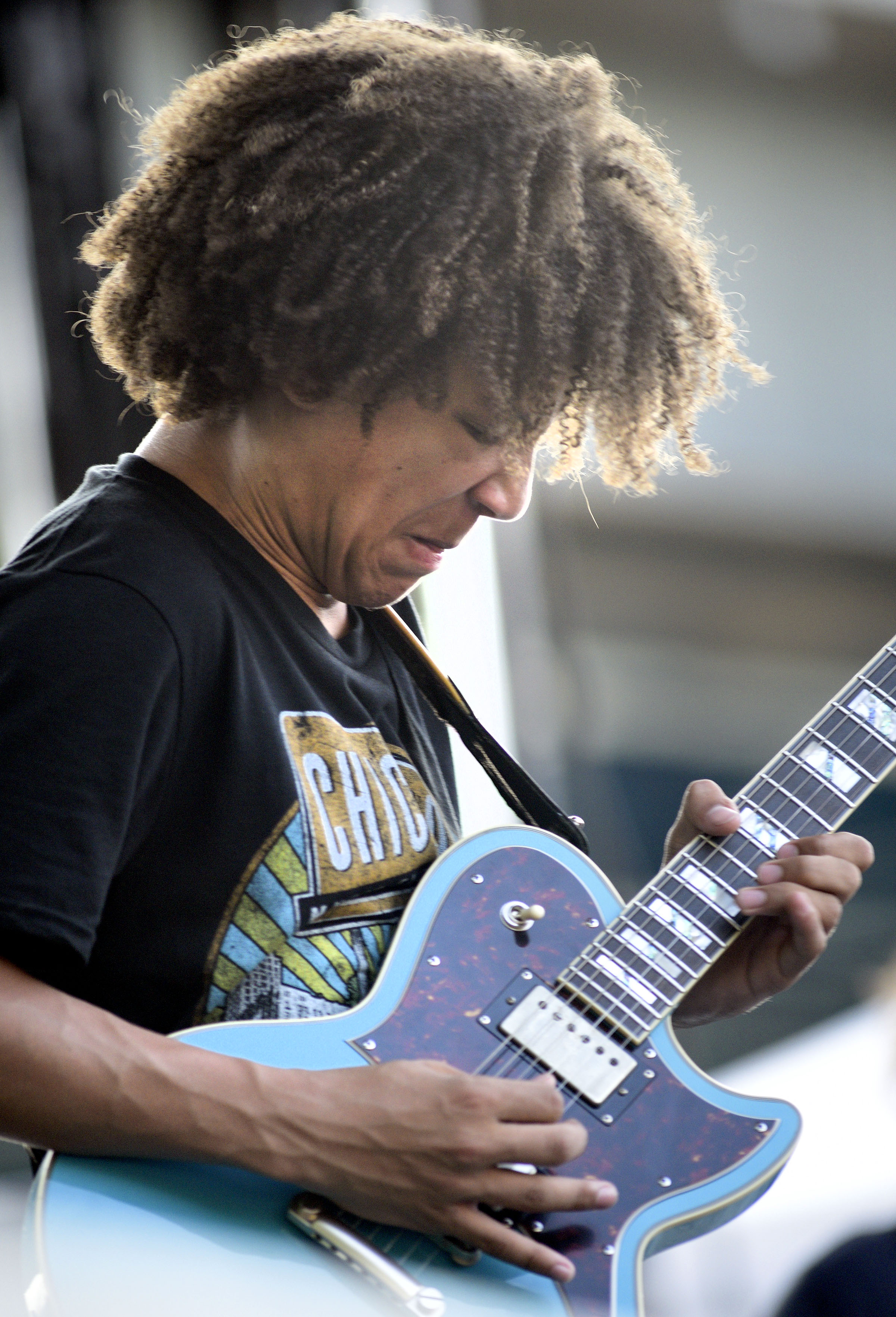Brandon “Taz” Niederauer grimaces as he plays a guitar solo on the Bud Lite Stage.  15-year old Niedarauer started playing when he was 8 and has played with many famous musicans such as Gregg Allman and Lady Gaga.  Macklemore was the featured act on the final night of the 2019 Riverbend Festival on June 1, 2019.
