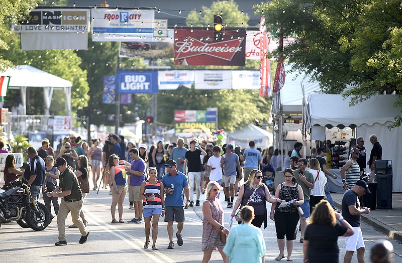 Festival goers fill Riverfront Parkway.  