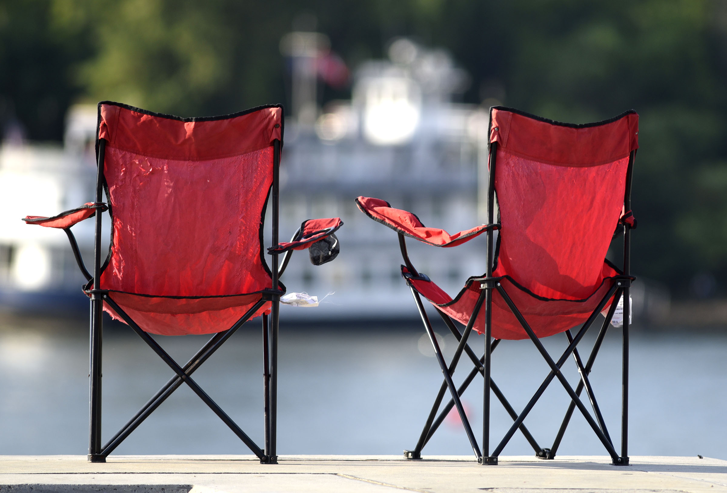 Two empty chairs await their owners at the Riverbend Festival.
