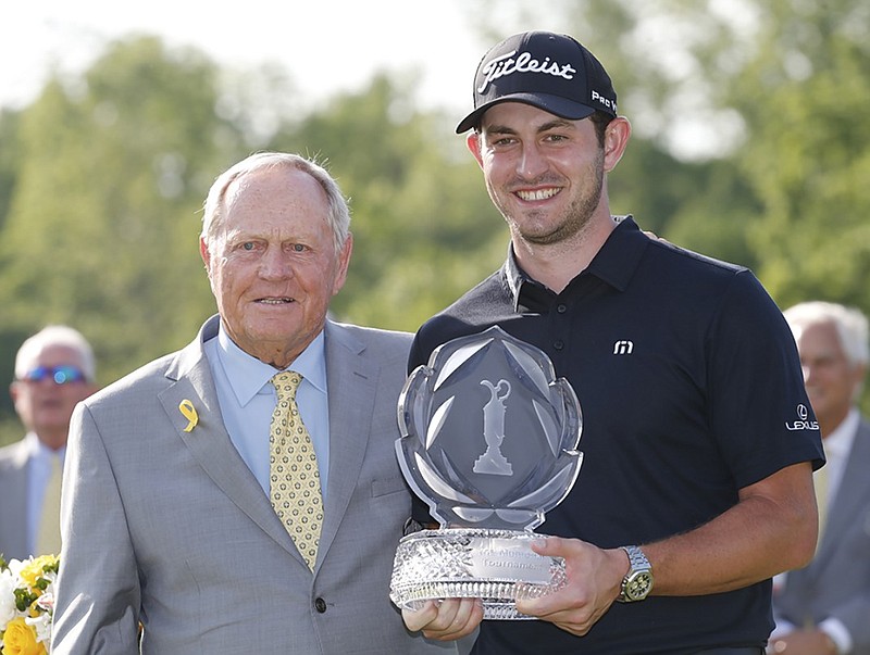 Jack Nicklaus, left, presents Patrick Cantlay with the Memorial Tournament trophy after Cantlay closed with a 64 to win the PGA Tour event Sunday in Dublin, Ohio.
