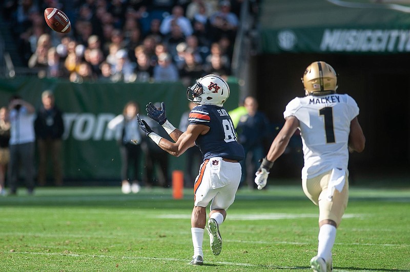 Darius Slayton makes one of his three touchdown receptions during Auburn's 63-14 win over Purdue in last December's Music City Bowl. The Music City Bowl will continue being tied into the SEC's postseason.