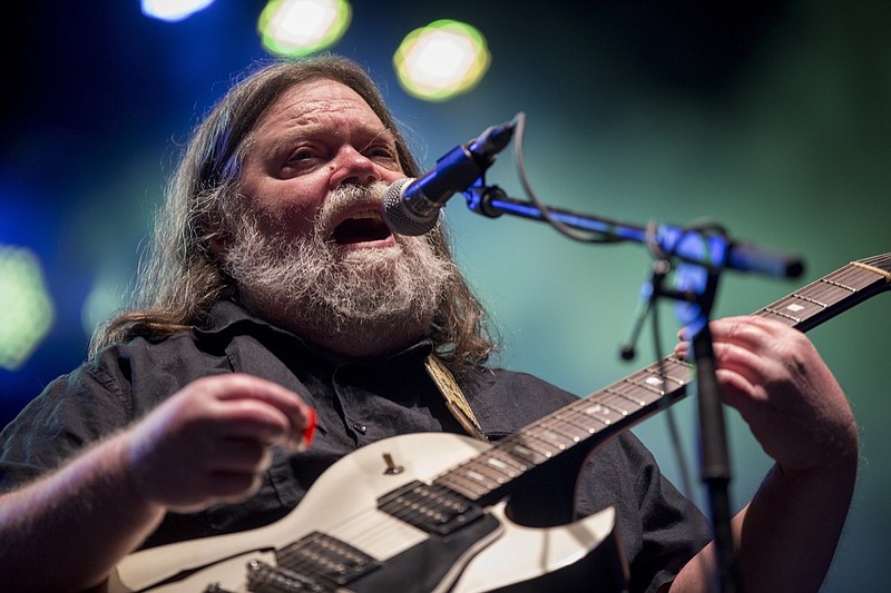In this March 17, 2018 photo, Roky Erickson performs at the South by Southwest Music Festival in Austin, Texas. Erickson, the blue-eyed, dark-haired Texan who headed the Austin-based 13th Floor Elevators, a pioneering psychedelic rock band in the 1960s that scored with "You're Gonna Miss Me," has died, Friday, May 31, 2019. He was 71. (Jay Janner/Austin American-Statesman via AP)