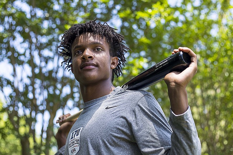 C.J. Abrams poses at his family's Alpharetta, Ga., residence, Friday, May 24, 2019. The Georgia high school shortstop is expected to be an early pick at the Major League Baseball Draft, Monday, June 3, 2019. (Alyssa Pointer/Atlanta Journal-Constitution via AP)

