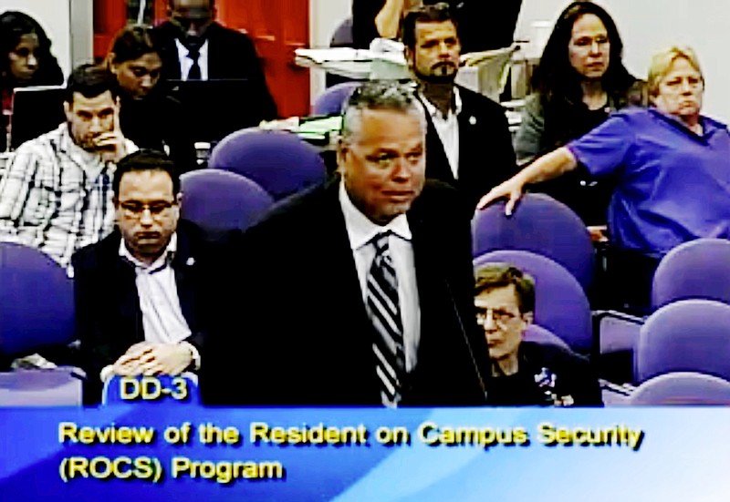FILE - In this Feb. 18, 2015, file frame from video from Broward County Public Schools, school resource officer Scot Peterson talks during a school board meeting of Broward County, Fla. Peterson, the then-Florida sheriff's deputy assigned to protect the high school where 17 died in a 2018 shooting has been arrested on 11 charges, Tuesday, June 4, 2019. State Attorney Mike Satz announced that 56-year-old Peterson faces child neglect, culpable negligence and perjury charges. (Broward County Public Schools via AP, File)