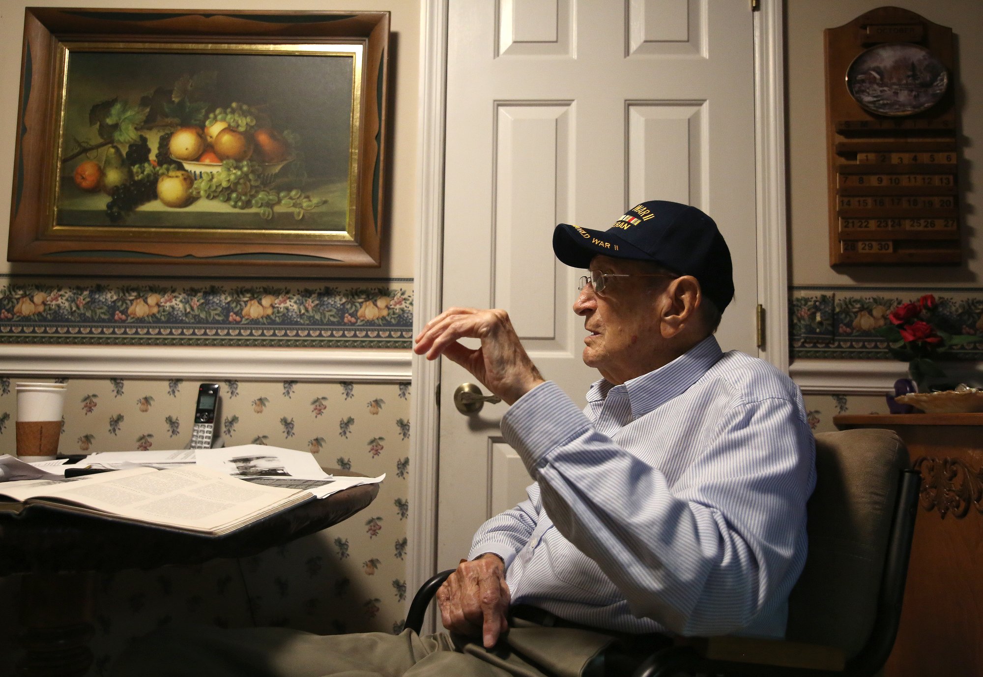 Ralph Painter talks about his time serving in World War II during an interview Monday, October 15, 2018 at his home in East Brainerd, Tennessee. Painter has suffered from blood circulation problems for most of his life from the frostbite that he got while serving in World War II.
