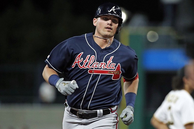 Atlanta Braves' Austin Riley rounds third after hitting a three-run home run off Pittsburgh Pirates relief pitcher Kyle Crick during the seventh inning of a baseball game in Pittsburgh, Tuesday, June 4, 2019. (AP Photo/Gene J. Puskar)

