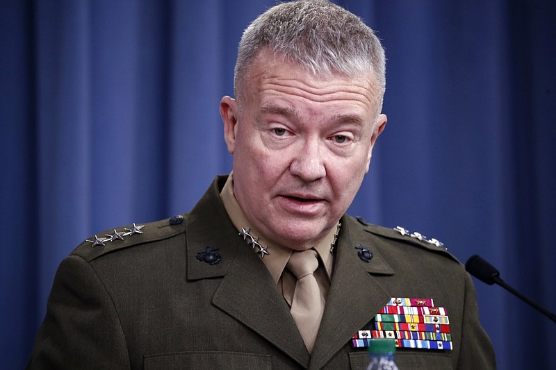 In this April1 14, 2018, file photo, then-Marine Lt. Gen. Kenneth "Frank" McKenzie speaks during a media availability at the Pentagon in Washington. McKenzie, the top commander of U.S. forces in the Mideast says Iran appears to have decided to "step back and recalculate" in response to a U.S. military buildup in the Persian Gulf area. (AP Photo/Alex Brandon, File)
