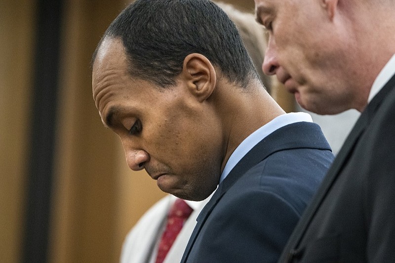 Former Minneapolis police officer Mohamed Noor reads a statement Friday, June 7, 2019, in Minneapolis, before being sentenced by Judge Kathryn Quaintance in the fatal shooting of Justine Ruszczyk Damond. Noor, convicted of shooting an unarmed woman to death as she walked toward his cruiser says he can't apologize enough "for taking the life of a perfect person. He sentenced Friday to 12 1/2 years in prison for the shooting. (Leila Navidi//Star Tribune via AP, Pool)

