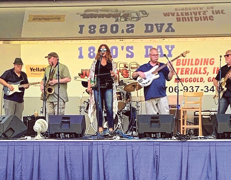 Courtney Day and The Daily Grind perform at the 1890's Day Jamboree last month in Ringgold. / Staff photo by Davis Lundy
