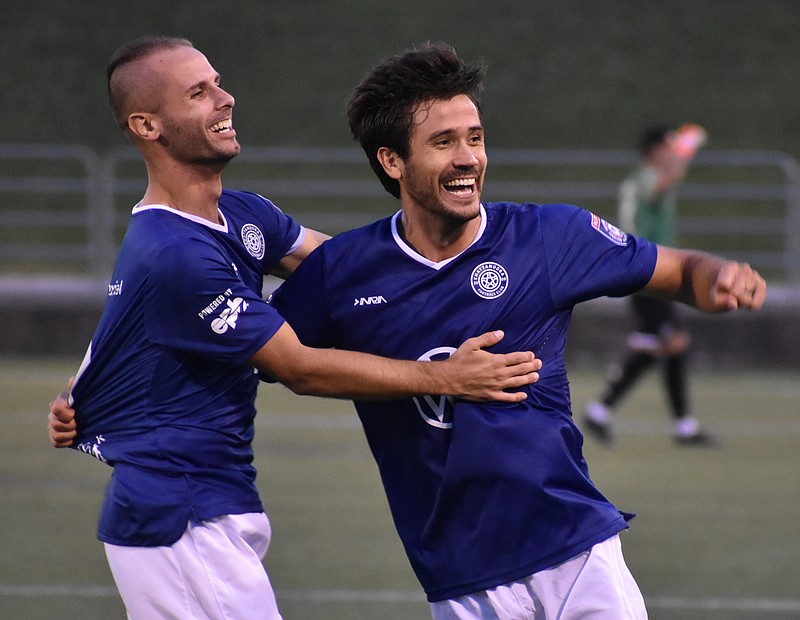 Chattanooga FC's Jose "Zeca" Ferraz, right, celebrates a goal with teammate Joao Costa during Saturday night's game against Inter Nashville FC at Finley Stadium. Zeca scored twice as CFC won 4-0 for its first NPSL victory of the season.