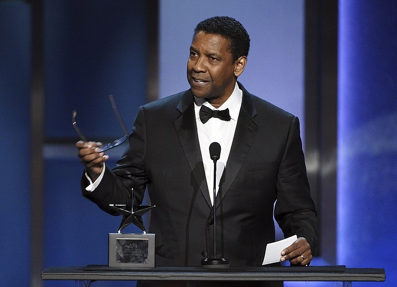 Actor Denzel Washington addresses the audience during the 47th AFI Life Achievement Award ceremony honoring him at the Dolby Theatre, Thursday, June 6, 2019, in Los Angeles. (Photo by Chris Pizzello/Invision/AP)

