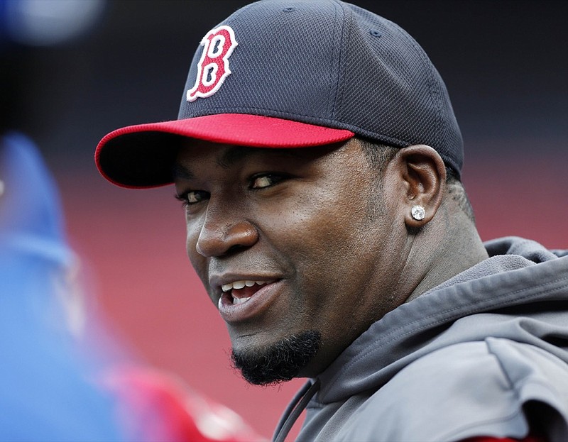 Boston Red Sox's David Ortiz talks with Toronto Blue Jays players before a baseball game in Boston, Friday, May 10, 2013. (AP Photo/Michael Dwyer)