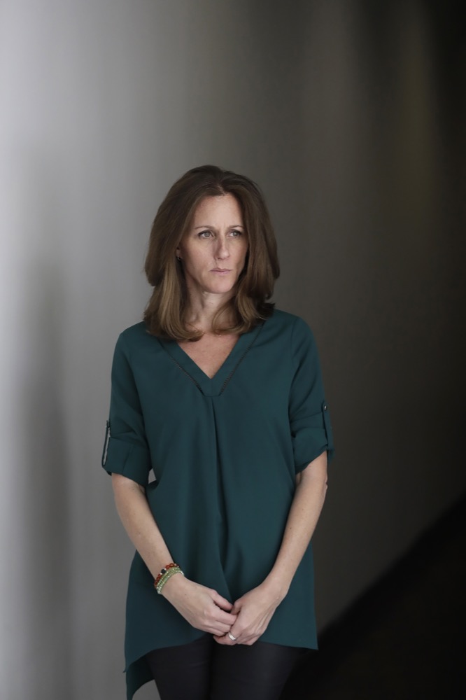 Kim Goldman poses for a portrait Friday, June 7, 2019, in Los Angeles. Goldman has continued to make the case publicly that it was O.J. Simpson who killed her brother and Simpson's ex-wife on a June night in 1994. Beginning Wednesday, Goldman will examine the case in a 10-episode podcast,