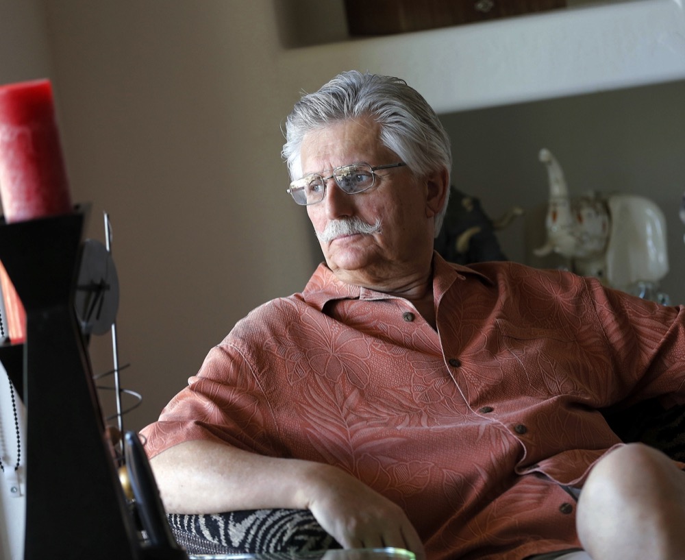 FILE - This May 20, 2014, file photo shows Fred Goldman, father of murder victim Ron Goldman, in his home in Peoria, Ariz. Fred Goldman has relentlessly pursued O.J. Simpson through civil courts, maintaining it is the only way to achieve justice for his son. Goldman's family has seized some of Simpson's memorabilia, including his 1968 Heisman Trophy as college football’s best player that year. (AP Photo/Matt York, File)